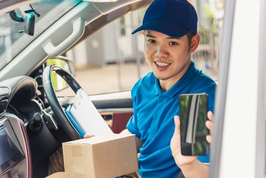 Asian delivery man courier online holding deliveries out boxes inside the car and using mobile smartphone checking location to contact the customer for shipment, Online shopping service concepts