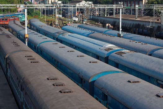 Indian trains at train station aerial view. Trivandrum, Kerala, India