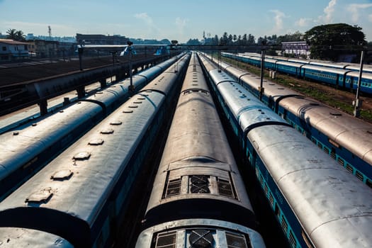 Indian trains at train station aerial view. Trivandrum, Kerala, India