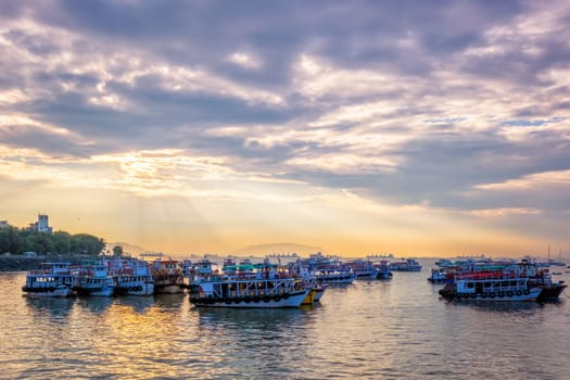 Tourist boats in sea on sunrise in Mumbai,Maharashtra, India