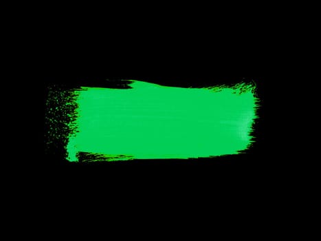 Sketch of green paintbrush drawing on black background
