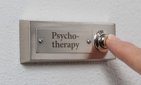 Doorbell sign with the engraving Psychotherapy