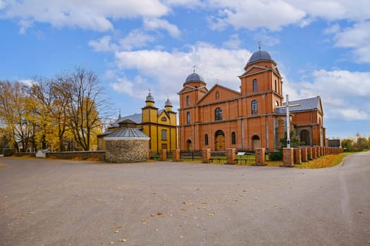 Old and new buildings of Malnava Holy Mary Mother of Rosary Church