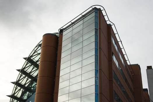 London, United Kingdom - November 25th, 2006: Architecture on modern east wing of St Thomas' Hospital (reconstructed in 1950s) with gray overcast sky in background.