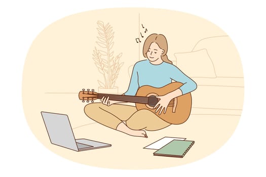 Online music lessons and learning concept. Smiling girl sitting playing guitar studying online looking at laptop on floor at home vector illustration