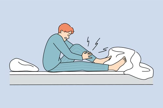 Man wake up at night suffer from cramp massage leg. Unhealthy unwell guy awaken in bed struggle with sudden muscle strain or spasm at home. Healthcare concept. Vector illustration.