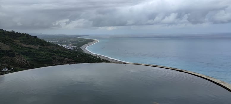 The Landscape View Of The Beautiful Eastern Coastline With Blue Sky And Water Tower Reflection From Huayuan Observation Deck, Taimali, Taitung