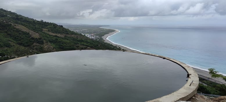 The Landscape View Of The Beautiful Eastern Coastline With Blue Sky And Water Tower Reflection From Huayuan Observation Deck, Taimali, Taitung