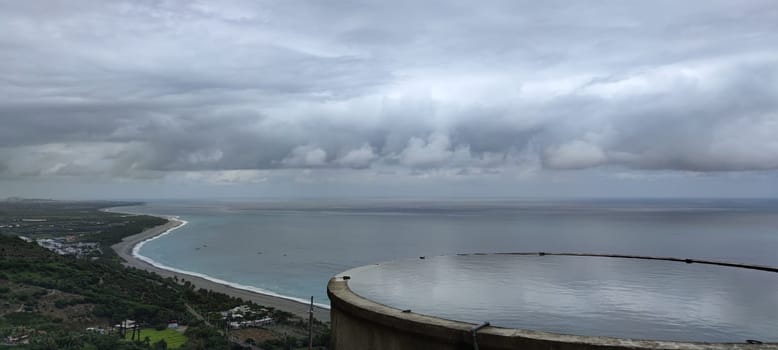 The Landscape View Of The Beautiful Eastern Coastline With Blue Sky And Water Tower Reflection From Huayuan Observation Deck, Taimali, Taitung