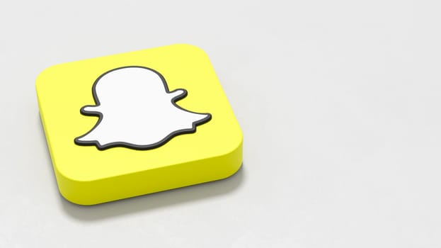 Snapchat Logo 3D Symbol Shape on Plastered Light Grey Background with Copy space 3D Illustration