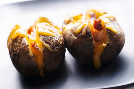 close up of cheesy jacket potato