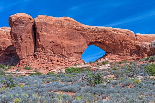 Dramatic Vista with a Window in the Desert in Arches National Park in Utah
