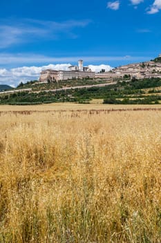 Assisi village in Umbria region, Italy. The town is famous for the most important Italian St. Francis Basilica (Basilica di San Francesco)