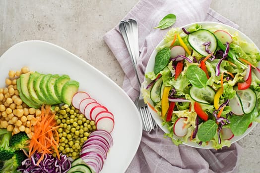 Healthy vegan lunch bowls. Vegetable salads with fresh and cooked mixed vegetables.