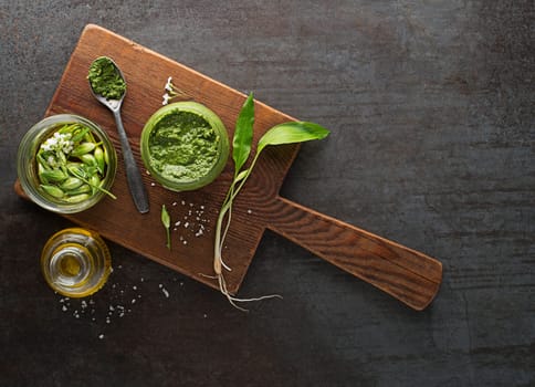 Making Fresh ramson or wild garlic pesto. Healthy spring food concept