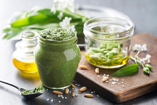 Making Fresh ramson or wild garlic pesto. Healthy spring food concept