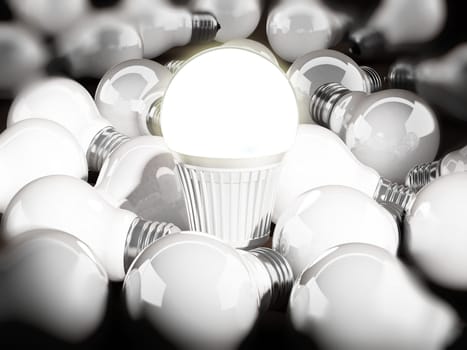 Energy efficient light bulb among standard light bulbs. 3d illustration.