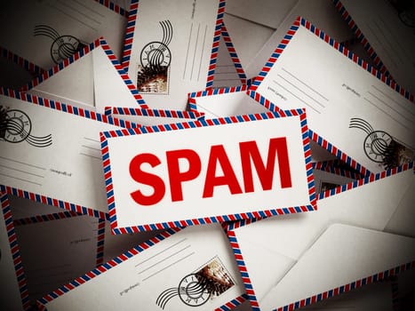 Smail mail among blank enveloppes. 3D illustration.