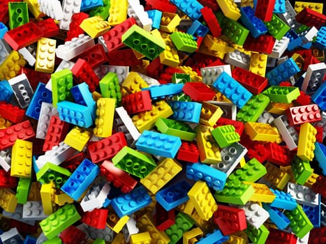 Multi colored building blocks background. 3D illustration