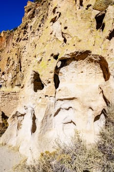 Natural cliff cavities expanded by ancestral puebloans at Bandelier National Monument