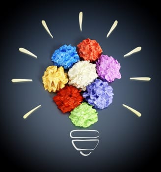 Colorful crumpled papers forming lightbulb shape. 3D illustration.