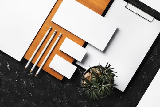 Photo of blank stationery set. Corporate identity template. Responsive design mockup. Flat lay.