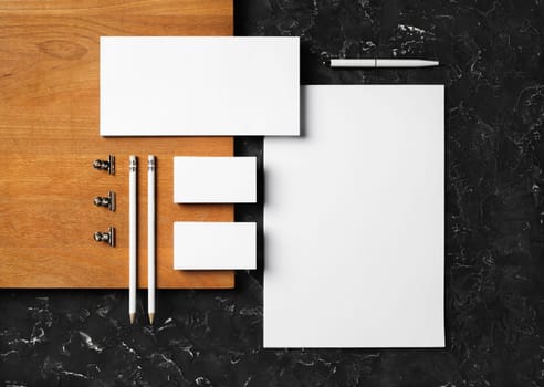 Blank corporate stationery set on wooden board background. Template for branding design. Branding mock up. Flat lay.