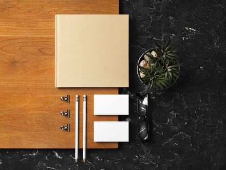 Branding stationery template. Blank corporate identity set and wooden board. Flat lay.