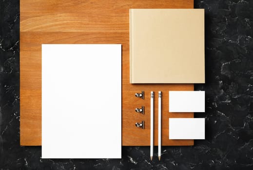 Blank corporate stationery template on wooden board background. Template for branding design. Branding mock up. Flat lay