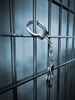 Handcuffs attached to metal prison bars.3D illustration.