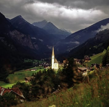 Alpine village Heiligenblut with church St.Vincent in Austria