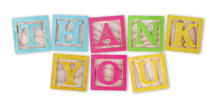 A thank you concept with childs wood blocks on white with clipping path to remove shadow