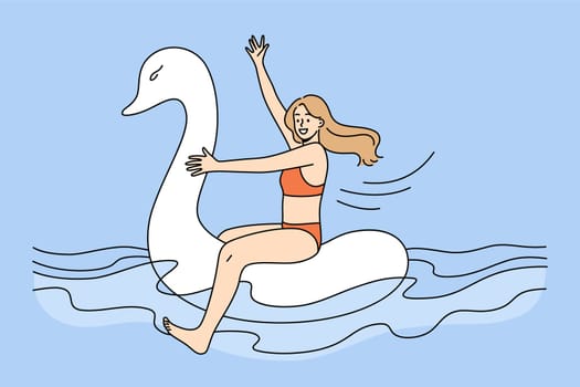 Funny happy girl in swimsuit floating on rubber swan in sea on summer vacation. Smiling young woman in bikini have fun swimming on inflatable ring on holidays. Vector illustration.