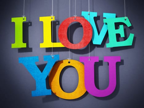 Paper multi-colored letters forming I love you text. 3D illustration.