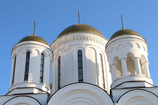 White stone church on a sunny day. Religion. Orthodoxy.