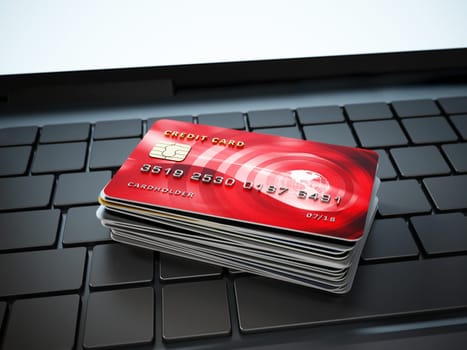 Credit cards standing on laptop computer keyboard. 3D illustration.