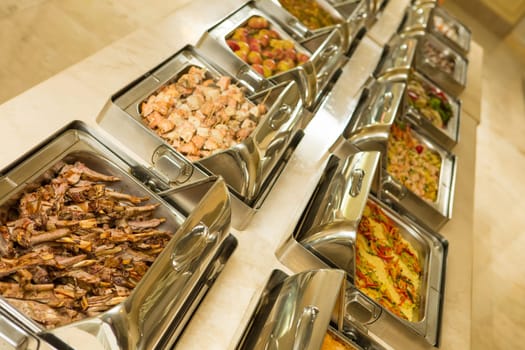 The food buffet in restaurant. Close up