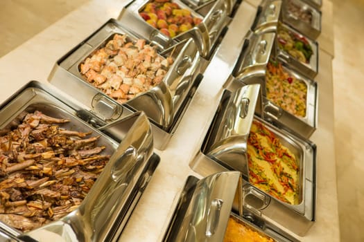 The food buffet in restaurant. Close up