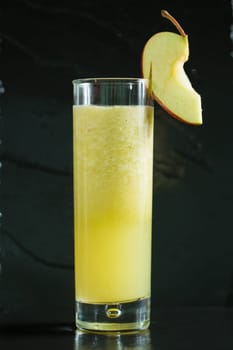 apple fresh juice in glass isolated on black