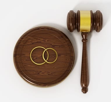 Wedding rings and gavel isolated on white background. 3D illustration.