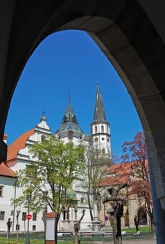 Medieval Town Hall with Bell Tower and church in Levoca, Slovakia