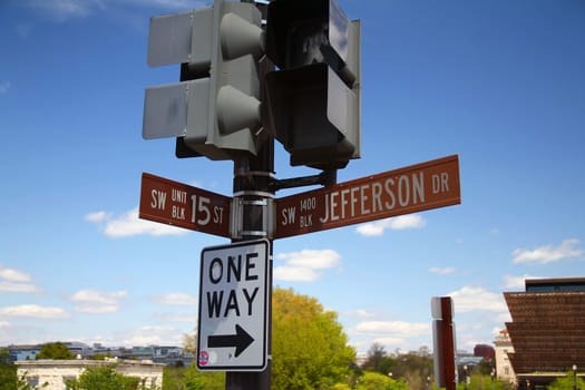 Brown 15 Street South West historic sign in downtown Washington D.C. at the intersection with Jefferson South West Drive, numbers 1400 Unit Block