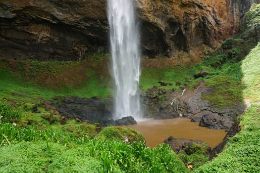 Small pool of one of the Sipi Falls at Mount Elgon National Park, eastern Uganda