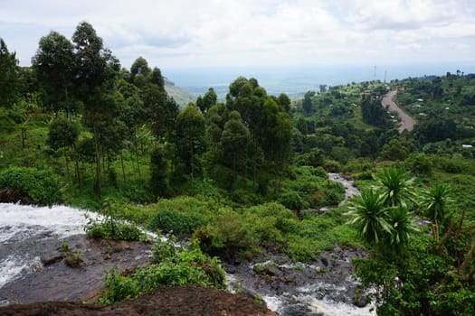 Picturesque view following the water from one of the Sipi Falls, eastern Uganda
