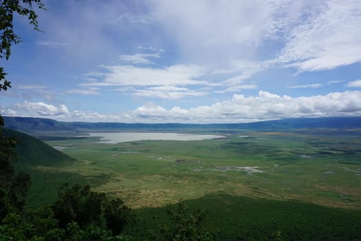 Spectacular view onto the vast Ngorongoro Crater with Lake Magadi inside, Tanzania 2021
