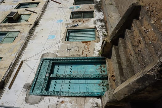 Richly adorned turquoise wooden door in Stone Town, Zanzibar, Tanzania 2021