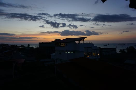 View from a rooftop onto the old town of Stone Town, Zanzibar at sunset, Tanzania 2021