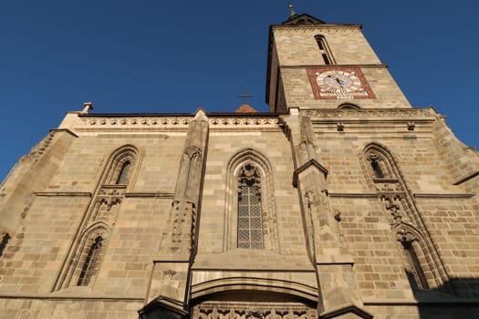 The facade of the Black Church in Brasov on a sunny day, Romania 2021