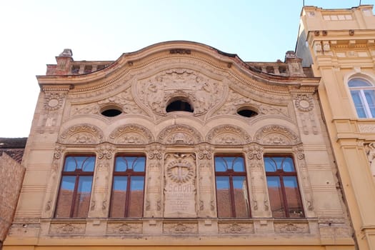 Art nouveau, Jugendstil facade of a house in Brasov with german inscriptions, Romania 2021