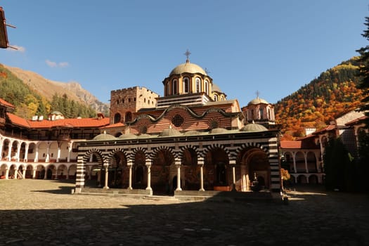 Picturesque view on the courtyard of Rila Monastery with it's Main Church, Bulgaria 2021
